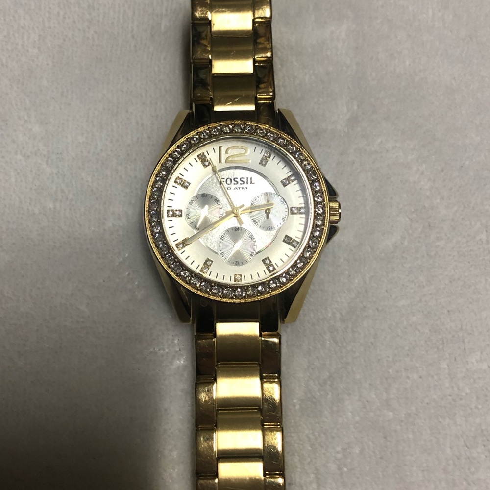 Used fossil watch. Gold with pave diamonds